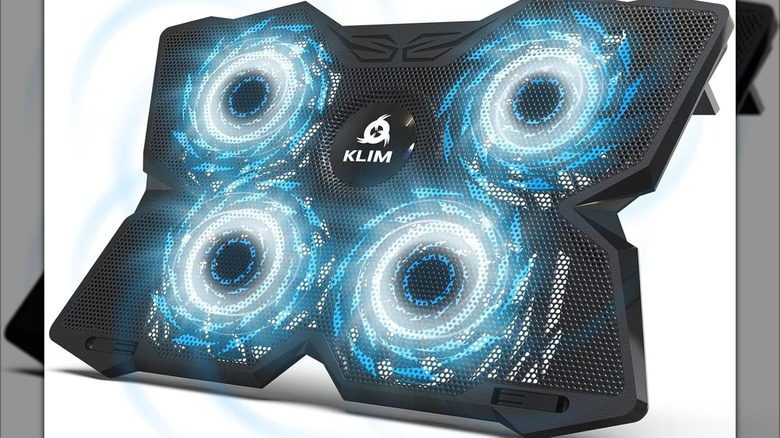 The Klim Wind cooling pad featuring four large blue LED fans and a mesh surface.