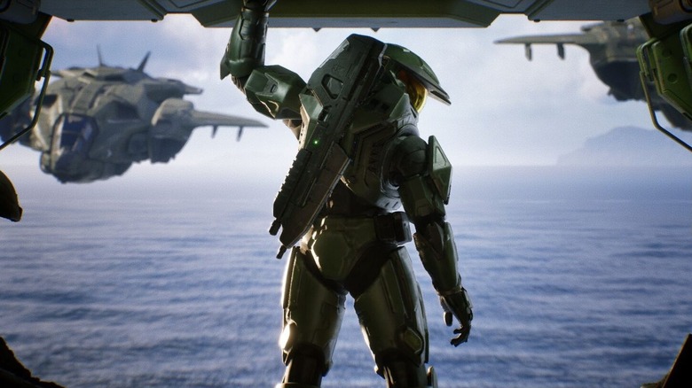 Master Chief in a high-action gameplay scene from Halo: Campaign Evolved.