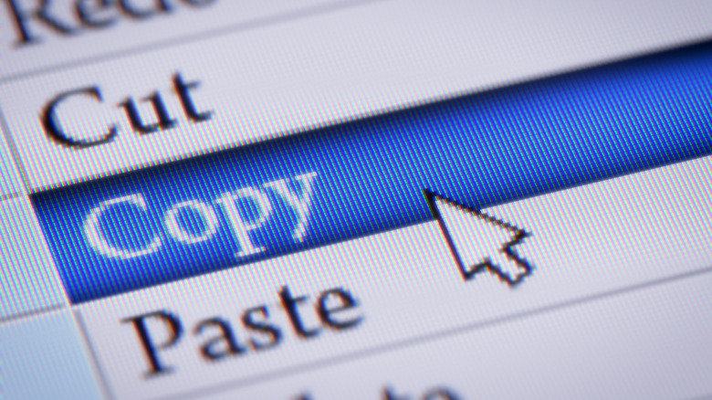 A cursor hovering over the copy option in the Google Lens desktop interface.