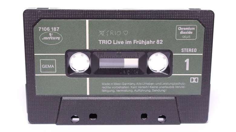 A vintage German audio cassette tape with green and black labels.