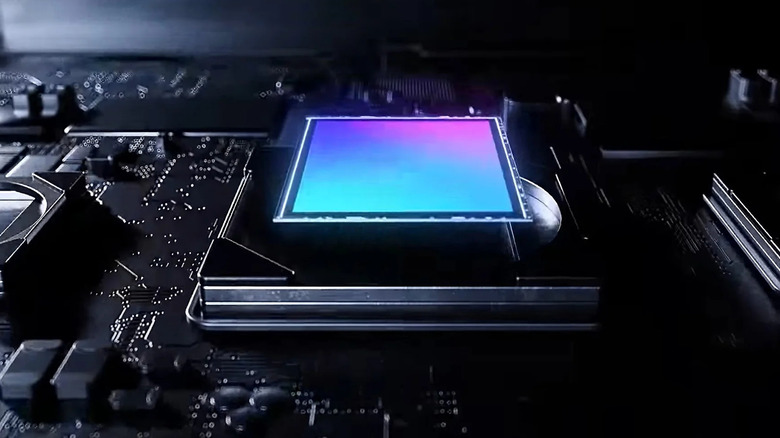 A Samsung ISOCELL image sensor component illustrated on a master chipset.