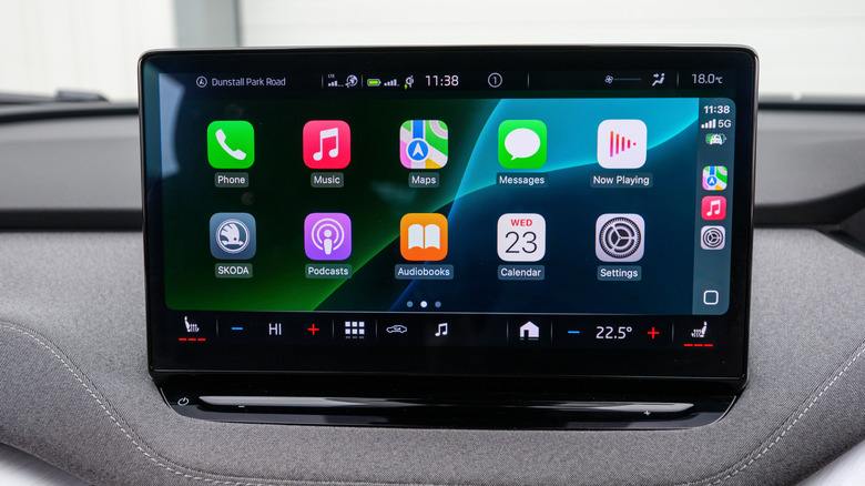 A high-resolution view of the Apple CarPlay home screen icons on a car display.