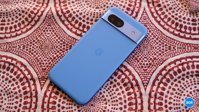 Close-up of the Pixel 8a on a soft cloth surface.
