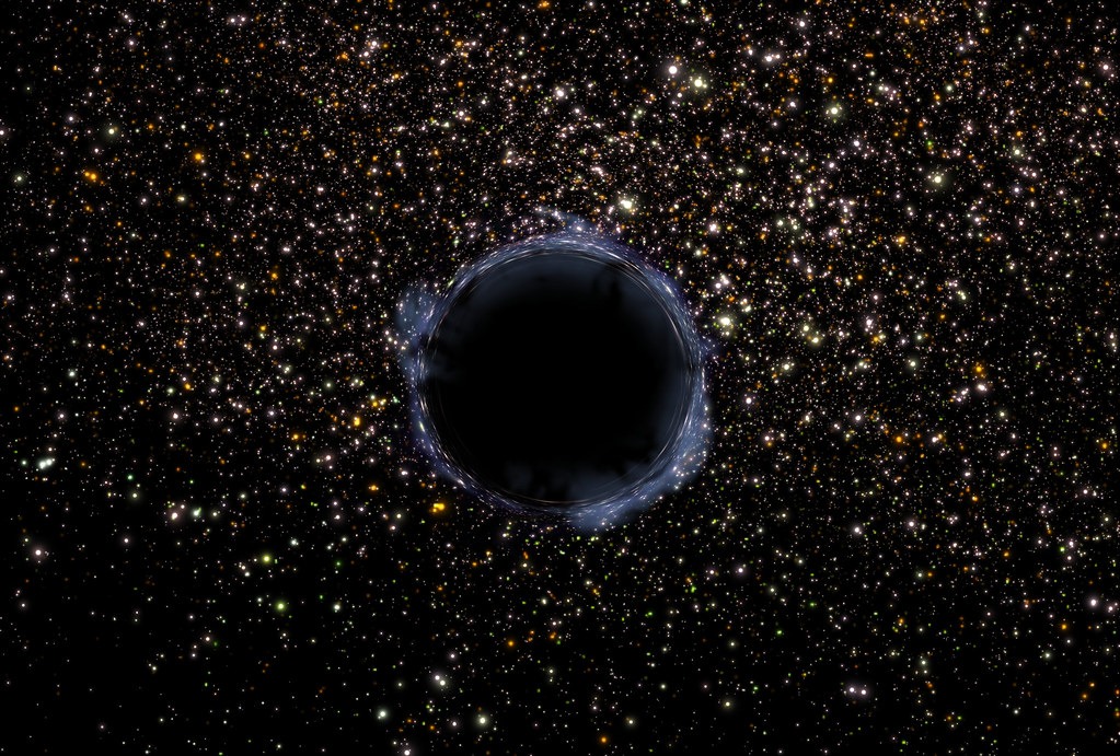 A scientific visualization of gravitational lensing showing light from a background galaxy warped into a circular Einstein Ring by a massive foreground object.