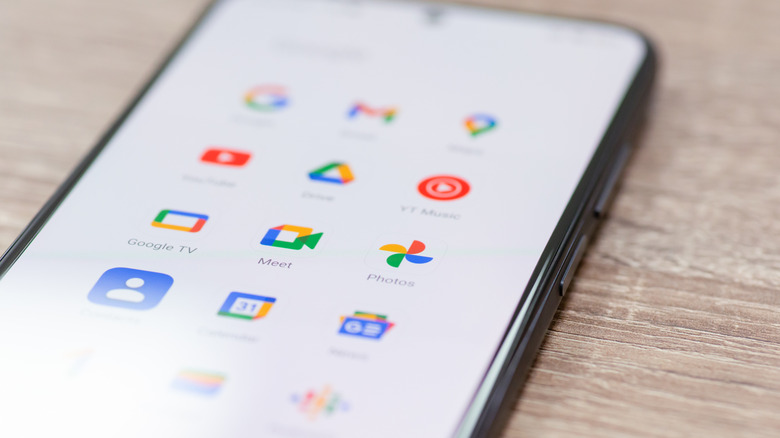 Close-up of an Android screen displaying a grid of Google workspace and productivity icons.