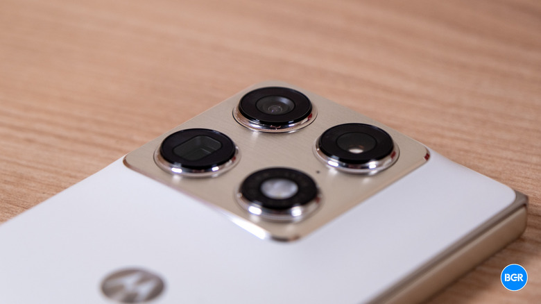Close-up of the triple 50MP camera module on the back of the Motorola Razr Fold.