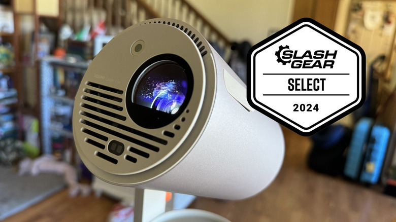 A side view of the Xgimi MoGo 3 Pro tilted at an angle on its integrated swivel base.