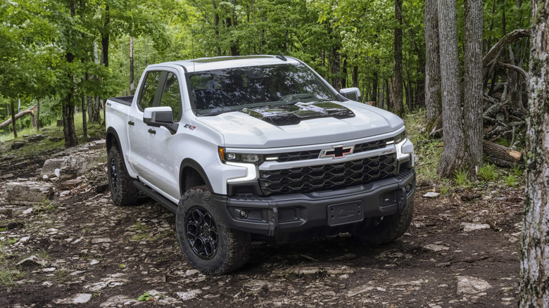 A Chevrolet Silverado ZR2 Bison navigating challenging dirt terrain.