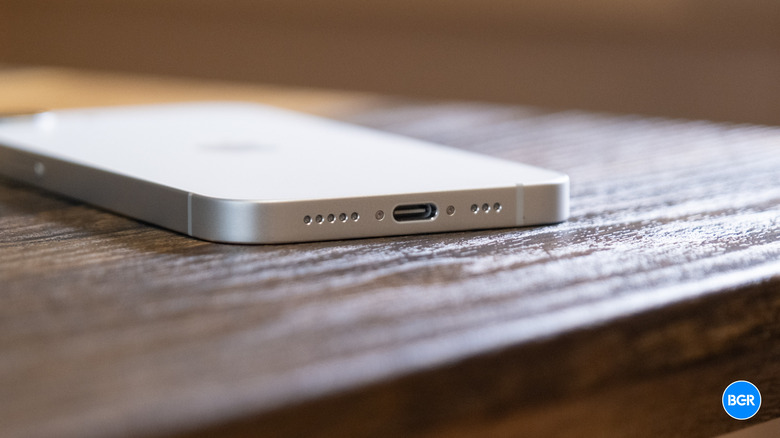 A close-up of the USB-C port on the bottom of the iPhone 17e.