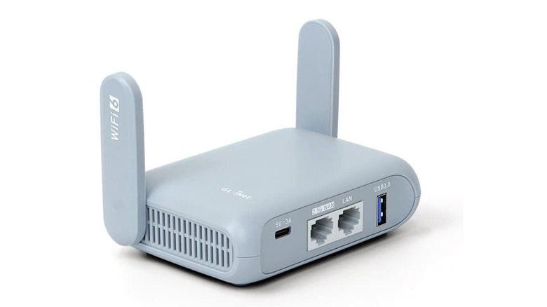 The GL.iNet GL-MT3000 travel router with its antennas extended against a white background.
