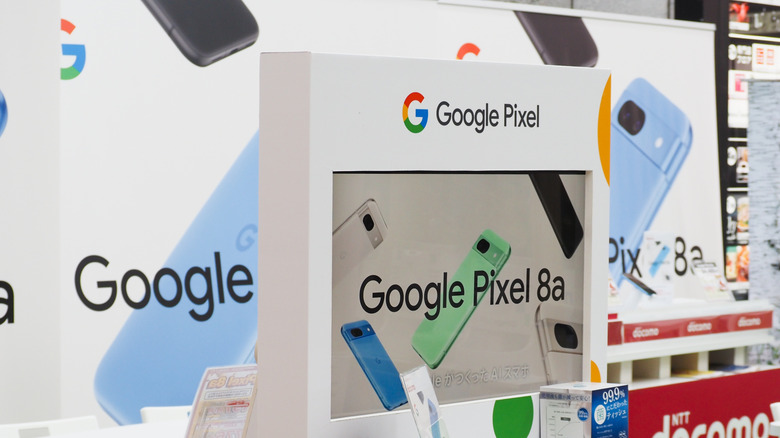 A Google Pixel 8a featured in a store promotion.