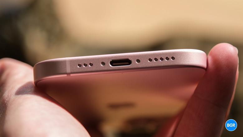 Close-up of the iPhone 15 USB-C charging port at the bottom of the device.
