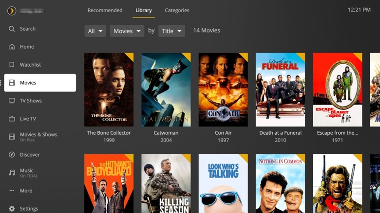 A screenshot of the Plex interface on Apple TV showing a library of movies and a navigation sidebar.
