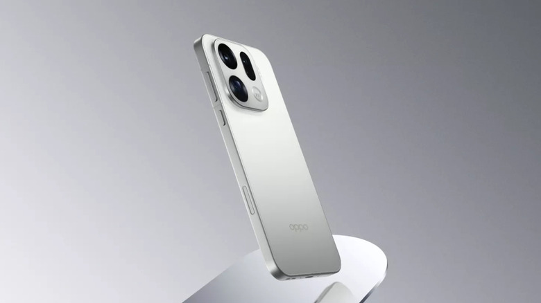OPPO Find X9 Pro in silk white on a gray background.