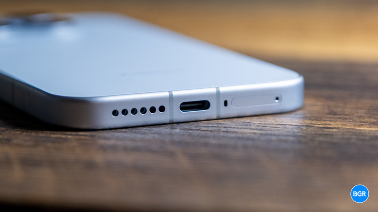 Close-up of the bottom edge of the Xiaomi 17 featuring the USB-C charging port.