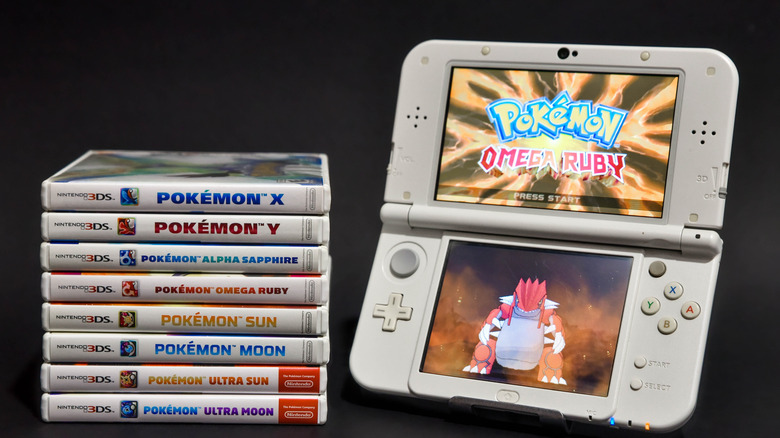 A Nintendo 3DS handheld featuring a Pokemon-themed game.