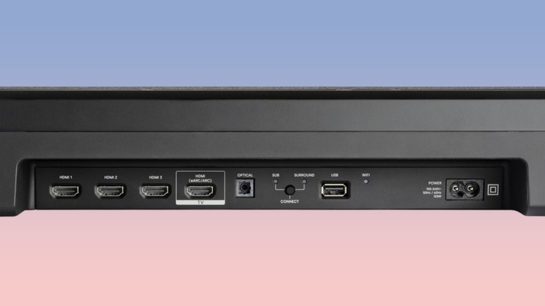 Close-up of the rear interface of a Polk Audio Magnifi Max AX soundbar showing multiple HDMI ports.