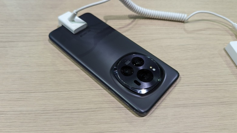 The rear camera module of the HONOR Magic6 Pro showing the triple lens setup.