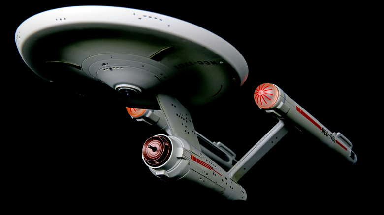 A 3D model of the USS Enterprise from Star Trek, showcasing complex assembly and detailing.
