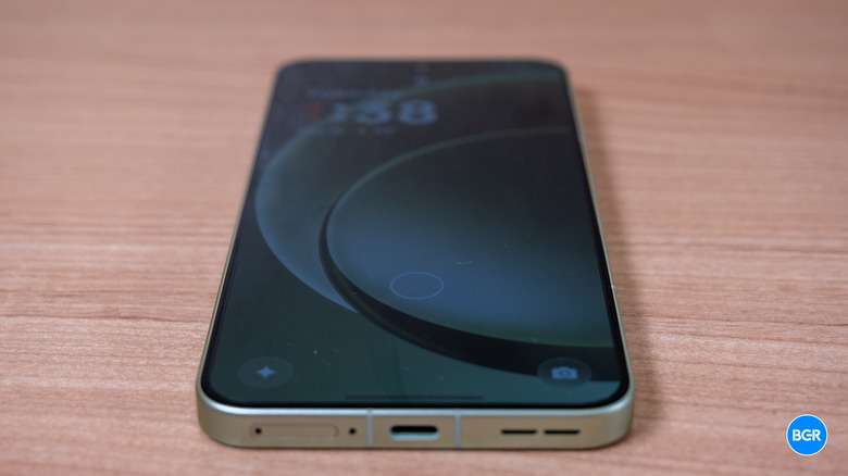 The 6.83-inch AMOLED display of the OnePlus 15R showing vibrant colors.