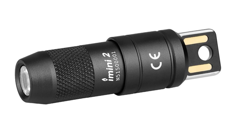 Close-up promotional image of the Olight Imini 2 showing its textured grip and keychain loop.