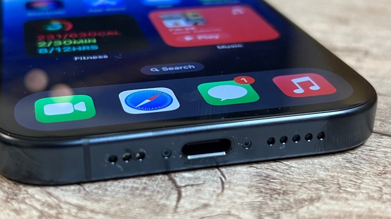 Detailed close-up showing the pristine condition of a refurbished iPhone 15 Pro port
