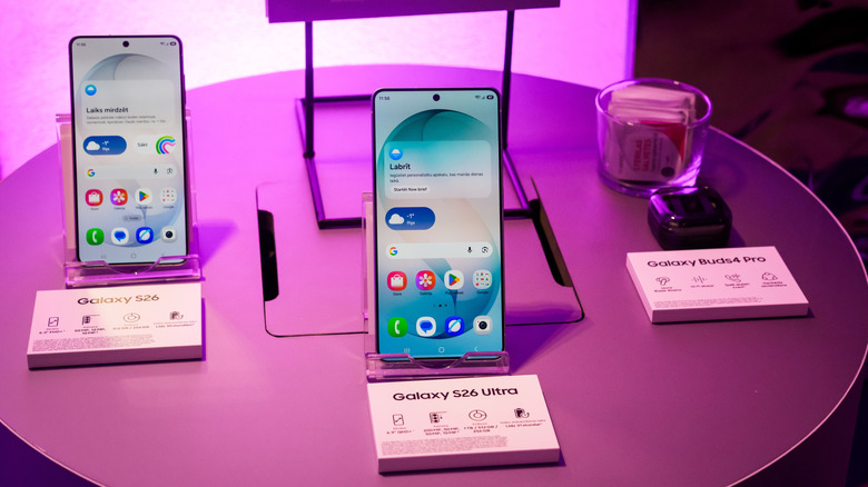 A lineup of new Samsung Galaxy S26 series smartphones on display at an event.