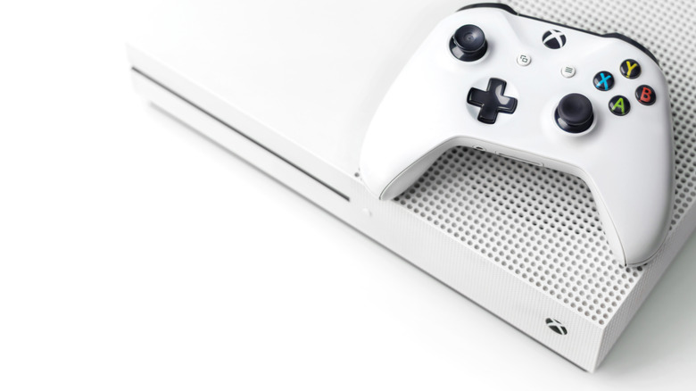 An Xbox One S console and controller.