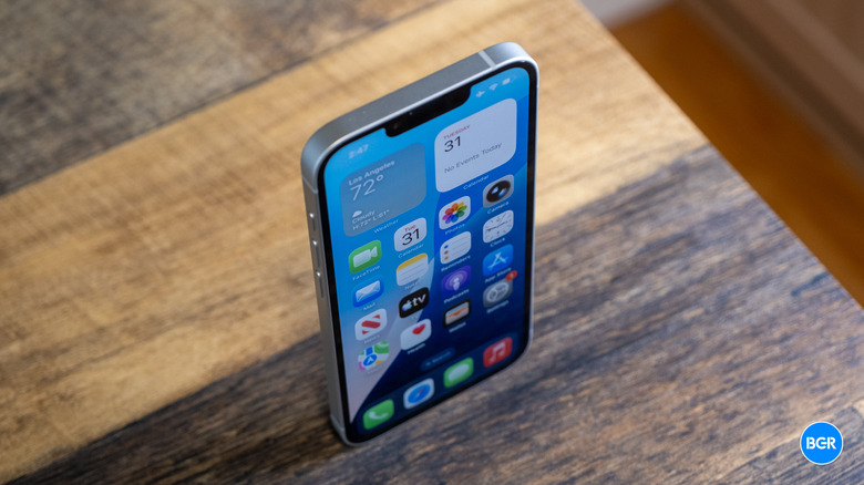 A top-down view showing the sleek edges and thickness of the iPhone 17e.