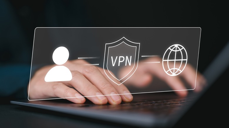 Hands typing on a laptop with a glowing digital shield overlay representing a secure VPN connection.