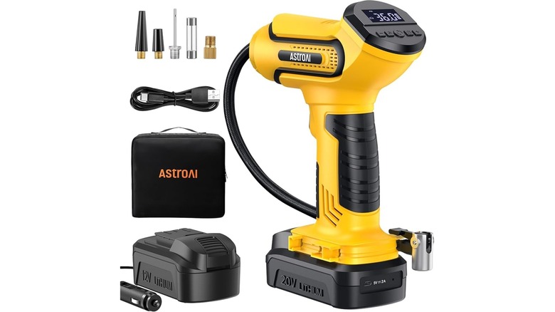 AstroAI cordless tire inflator displayed with multiple specialized nozzle attachments and its charging cable.
