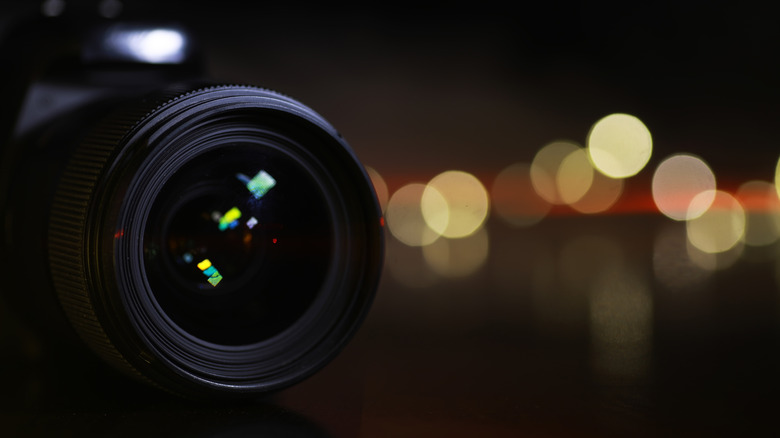 Close-up macro shot of a camera lens glass element.