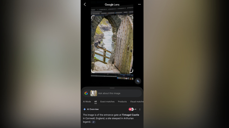 Smartphone screen using Google Lens to identify a building in Cornwall.