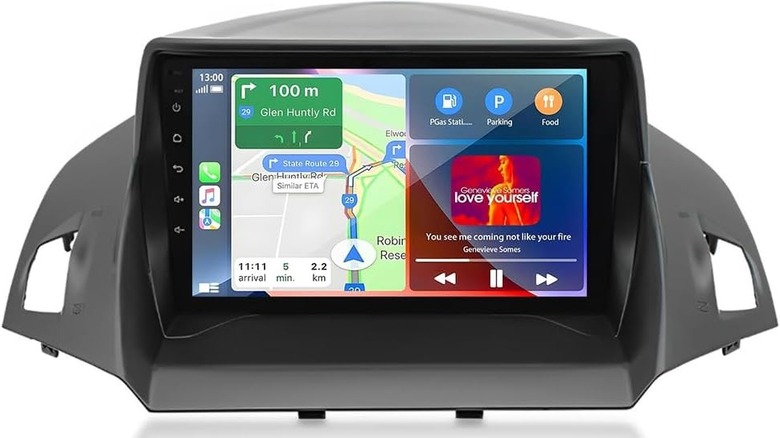 An aftermarket Android head unit kit including the screen and wiring harness.